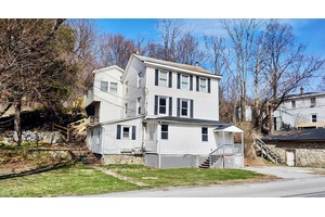 This beautifully renovated two unit apartment building is situated in the charming hamlet of New Hamburg, offering a prime investment opportunity in a highly desirable location.