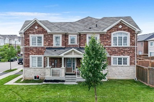 Welcome to 297 Reis Place A Sun filled corner home set on a pie shaped over sized lot.