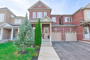 Welcome to this Link Detached home Detached home only attached from garage.