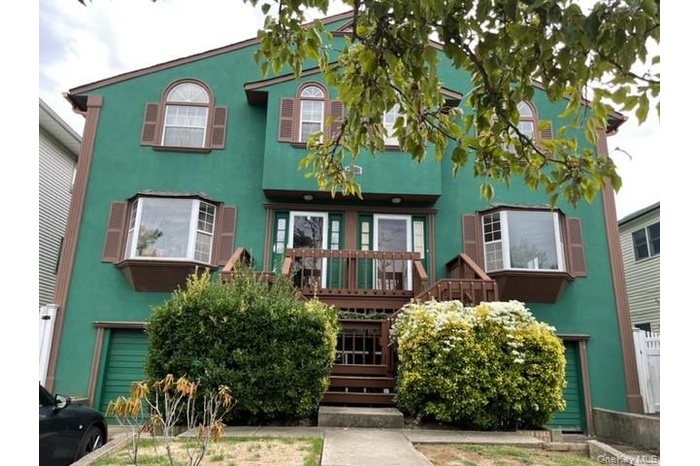 View of front of home with stucco siding