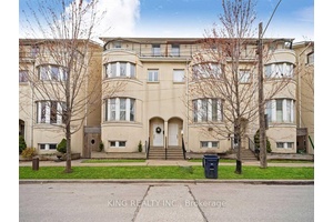 Sun filled executive townhome featuring soaring 10 ft ceilings and an open concept layout.