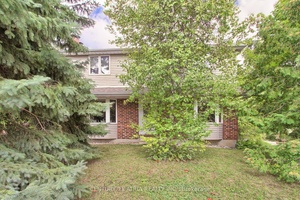 A Hidden Gem in one of Richmond Hills most sought after areas with a green paradise and river stream setting.