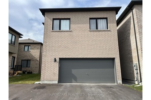 Cozy amp ; Bright 2 Bedrooms W 2 Parking Coach House In a Quiet Community Fronting A Park, Separate Entrance, Custom Kitchen With Quartz Counter amp ; Tiled Back Splash.