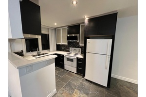L Shape property. Main Unit including the upper floor and basement.