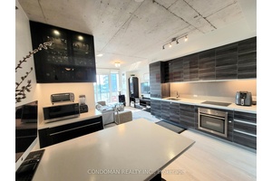 Wow ! Bright, open west view from Gorgeous 2 Bed 2 Bath On Trendy Queen Street West !