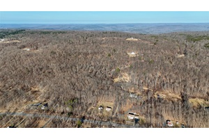 This expansive 166. 5 acre property spans two parcels, with 137.