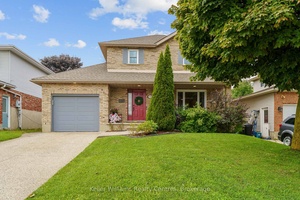 This red door brick beauty checks every box 3 bedrooms, 3 bathrooms, and 1, 892 square feet of stylish, family friendly living across 3 fully finished levels complete with curb ...