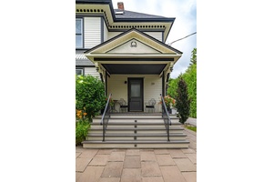 Modern sophistication meets historic elegance in the beautifully restored Bigg Strong House circa 1900, located just two blocks from Main St.
