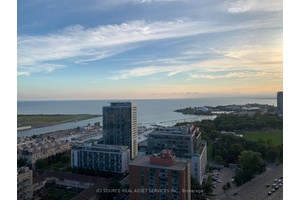 Lakeshore And Bathurst, Stunning 2 Bedroom, 2 Bathroom Condo With 9 Ceilings And Hardwood Throughout.