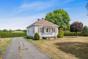 Discover this cozy and well maintained 2 bedroom bungalow, ideally situated just minutes from town in a fantastic location that offers both convenience and tranquility.