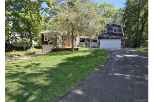 Welcome Home ! Expanded Ranch in Sound Beach with 4 Bedrooms 1st Floor Living Room, Dining Room, Eat In Kitchen, 3 Bedrooms, 1 bath, Wood Burning Fire Place and Hardwood ...