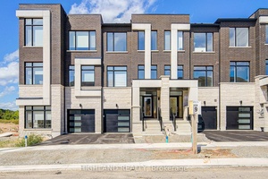 Welcome to this Brand New Luxury Rear Lane Freehold 3 Storey Townhouse with Basement, Nestled in the Prestigious Joshua Creek Community of Oakville !