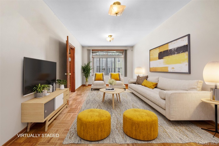 Living area featuring baseboards