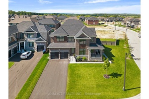 Welcome to 1 Twinleaf Crescent, an absolute showstopper luxury corner home on a premium oversized lot, ideally situated across from a future community park.