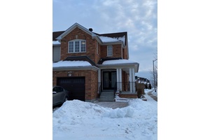 Corner Unit Townhouse Located In High Demand Location.