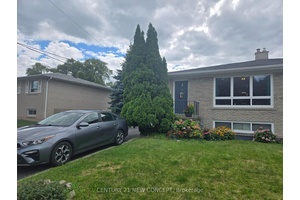 Exceptionally Well Maintained Four Level Side split Backing Onto The Ravines Of Sheldon Creek Offering Incredible Privacy with 3 separate Entrances.