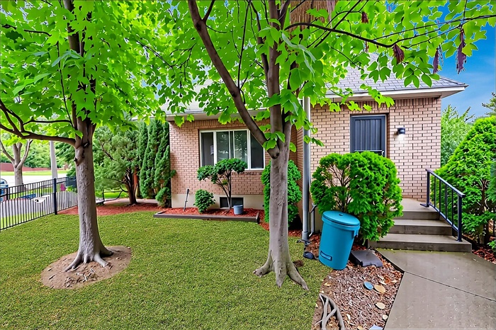 View of front of property with brick siding