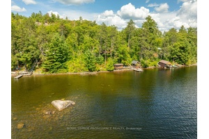 It is still a great time to consider this primarily water access property and enjoy the Fall beauty.