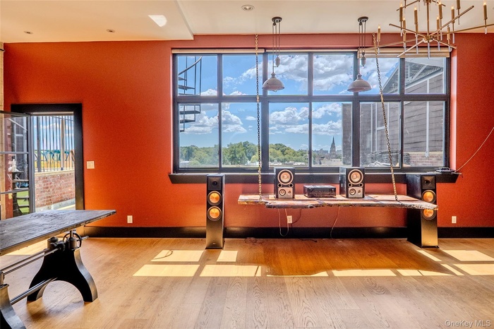 Dining room with wood finished floors and baseboards