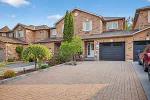 Situated in the highly sought after Kingswood community of Bayshore, this meticulously maintained freehold townhome offers both style and convenience.