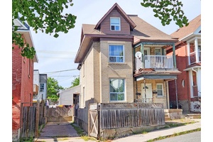 This 3 storey detached home in West Centretown is currently configured as an up and down duplex, with a separate side entrance to the upper unit.