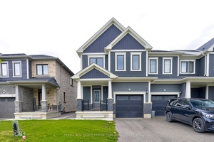 This bright and spacious 2 storey freehold End Unit Townhome features an open concept great room and breakfast area with walk out to the private, fully fenced yard.