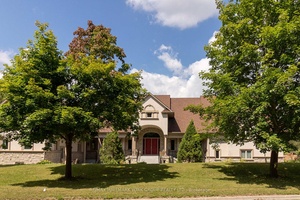 Step beyond the ordinary and into an architectural opus a custom estate of approx.