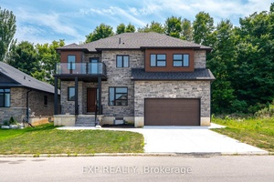 Step into this stunning 4 bedroom, 2 full bathroom, carpet free upper unit where thoughtful design meets luxury living.