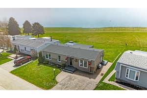 Welcome to carefree living at its finest in the sought after Wilmot Creek community on the shores of Lake Ontario !