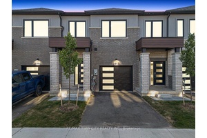 Welcome to this modern style beautiful 3 bedroom town with lots of upgrades and nestled in an upscale community.