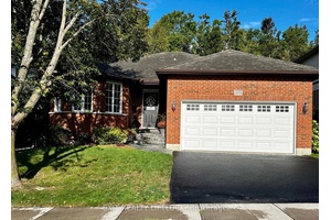 Backed by a protected forest with direct trail access, this home offers privacy, nature, and convenience just minutes from Trent University in desirable University Heights.