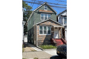 Welcome to this beautifully maintained modern 2 family home.
