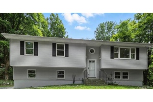 Discover the potential of tranquil living at 5760 Route 82 in Clinton Corners.