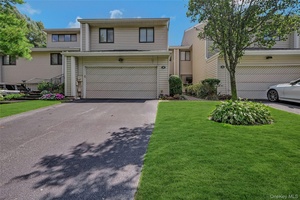 Located in the Woodbury Greens community, this Aspen model townhome offers three bedrooms, two full bathrooms, and one half bathroom.