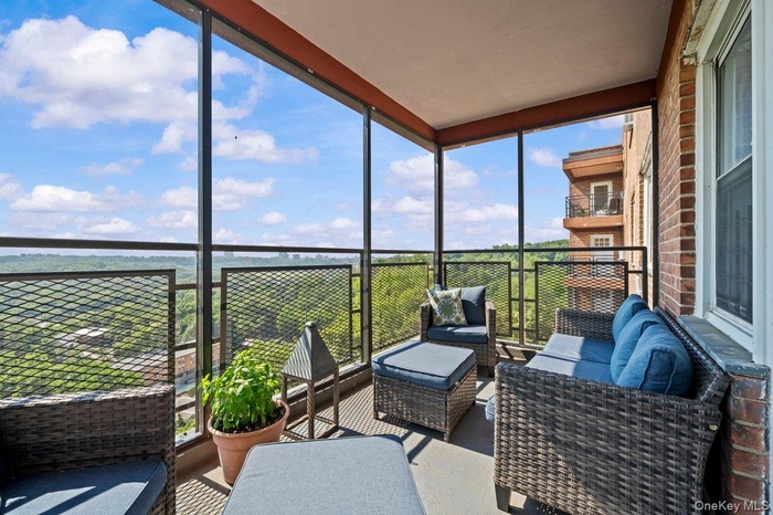 Sunroom / solarium featuring an outdoor living space