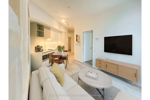 Welcome to this beautifully appointed 1 1 bedroom suite, offering a thoughtfully designed open concept layout with floor to ceiling windows that flood the space with natural light.