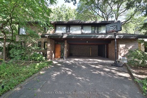Beautifully updated contemporary home in coveted Lytton Park, perfectly set on a rare ravine lot within a highly regarded school district.