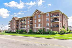 Rare find this bright corner unit condo comes with 2 parking spaces !