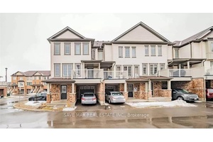 Stunning end unit townhome that feels just like a semi !