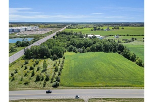 Spacious 10. 6 Acre Property Prime Location Near Hwy 401 and Amazon Warehouse !