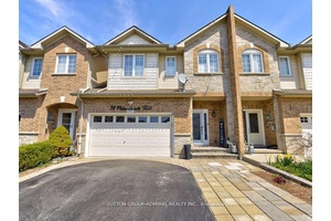 This is an absolute Showstopper of a home nestled between the beautiful and peaceful waterfront and the convenience of the nearby highway.
