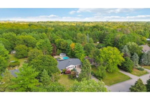 Rarely offered 80x300 backyard retreat backing onto Heber Down Conservation !