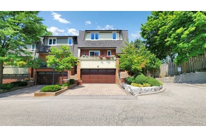 Impressive Executive End Unit In Sought After Quail Valley Backing Onto Ravine !