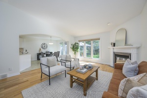 Set on a tree lined lot in sought after Sunningdale, this all brick ranch blends the ease of main floor living with a warm, open design and over 3, 180 ...