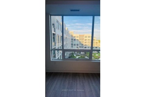 A stunning 660 sq. ft 1 bedroom den, 1 bathroom residence offering an elevated living experience with modern design, upscale finishes, perfect for evening light and outdoor relaxation.