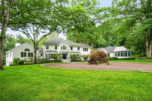 Prime Bedford gated estate on over 15 glorious acres of open, level land with spectacular age old specimen trees.