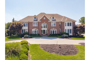 Welcome to luxury living in the prestigious Legends Circle, where a rare opportunity awaits to own the sought after Sterling Model.