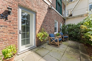 Step into this delightful garden level 2 bedroom, 2 bath apartment at Brooklands, a beautiful 1927 Georgian style complex recognized for its elegant architecture and beautifully landscaped grounds.