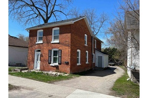 Legal Duplex Century home with two large 2 bedroom units and a possibility of a third in the basement.