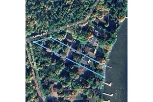 This Exquisite Year Round Waterfront Home On Cameron Lake Offers Unparalleled Lakeside Living !